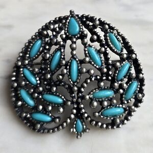 Vintage silvertone faux turquoise southwestern style brooch pin marked nYt